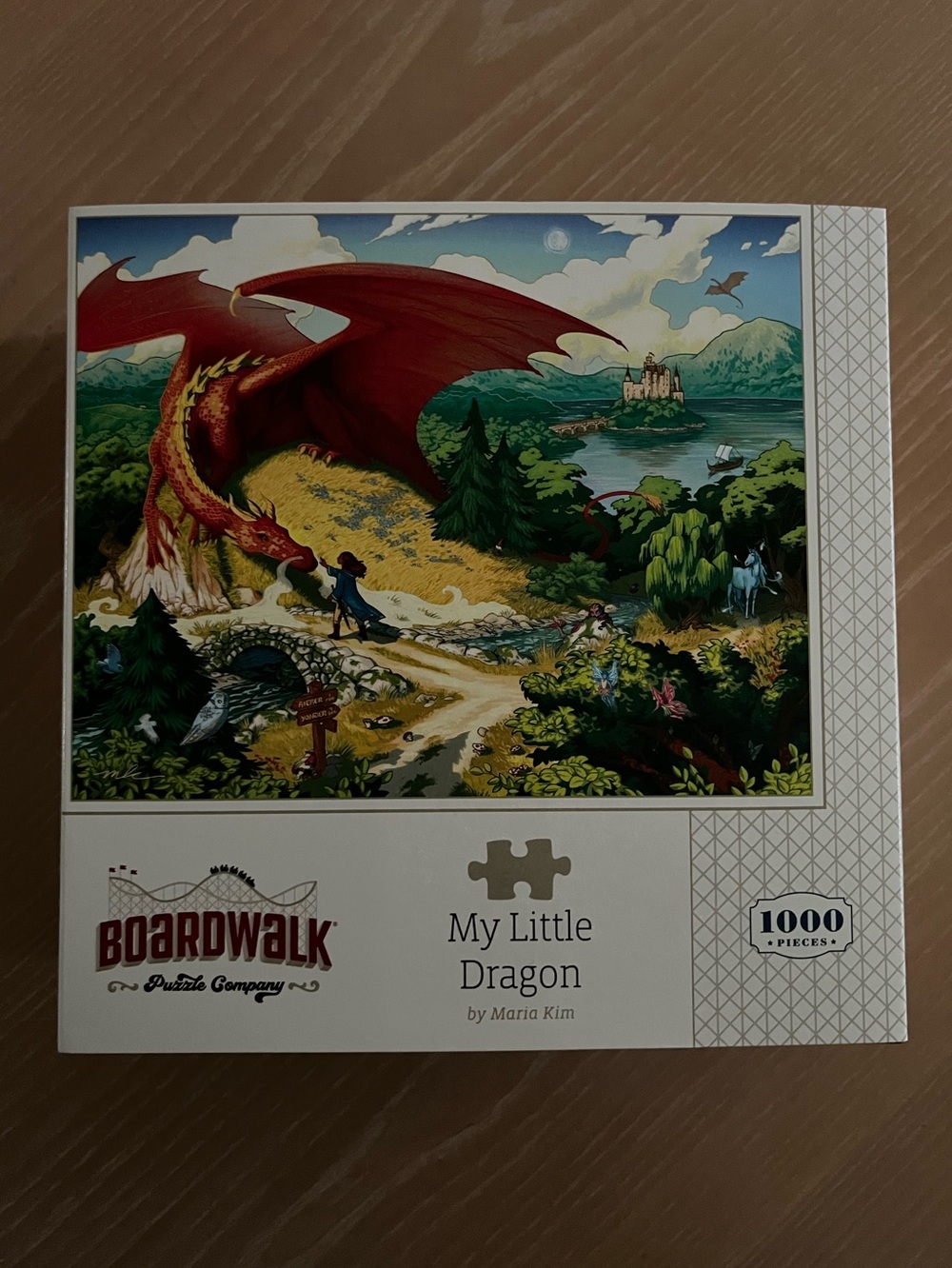 1000 piece My Little Dragon jigsaw puzzle by Boardwalk Puzzles.
